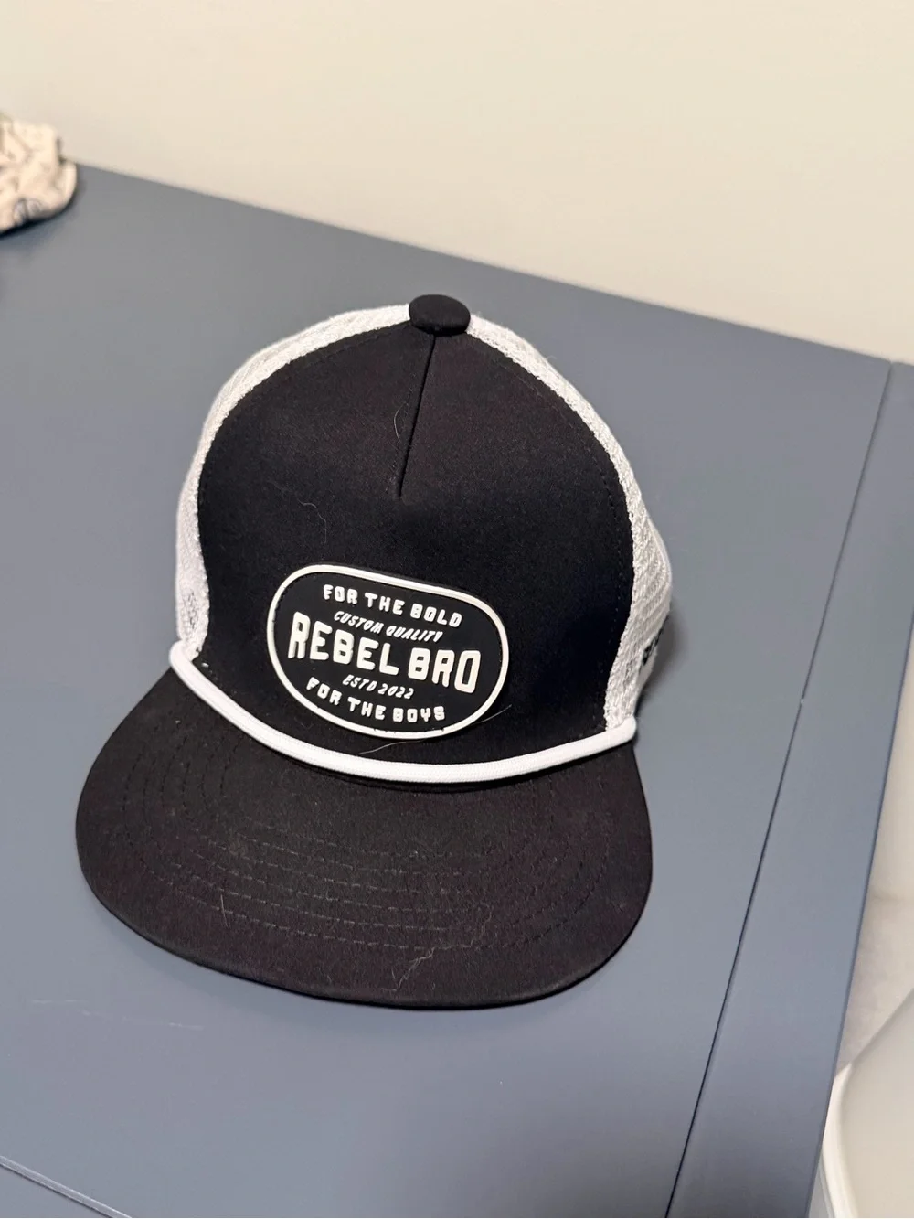 Newborn Rebel Bro Trucker Hat